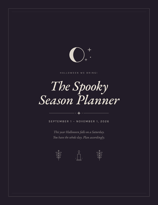 The Spooky Season Planner 2026 cover — crescent moon, cream type on deep plum